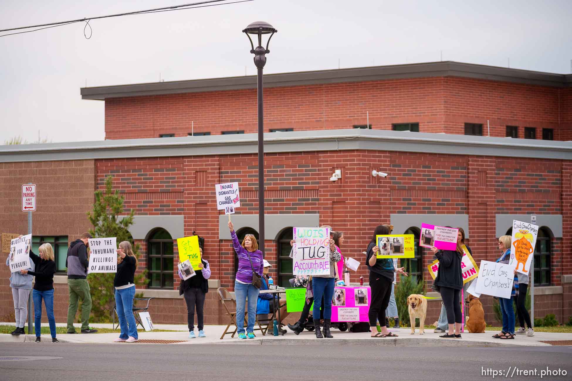 (Trent Nelson  |  The Salt Lake Tribune) Protesters gather at the Pleasant Grove Police Department, upset that North Utah Valley Animal Services continues to use a gas chamber to euthanize animals, on Thursday, April 28, 2022.