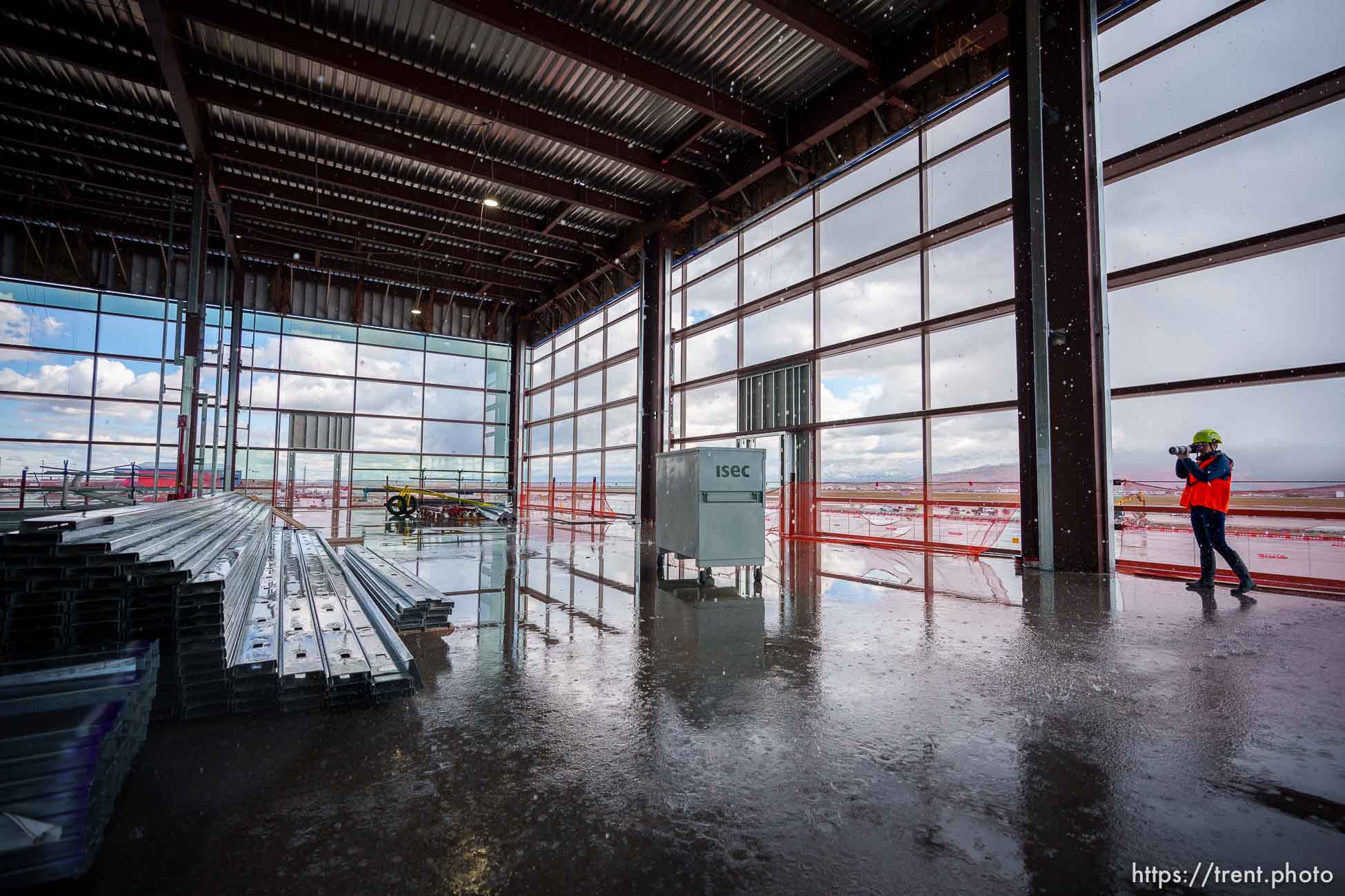 (Trent Nelson  |  The Salt Lake Tribune) Media tour the construction of Concourse A East at the Salt Lake City International Airport in Salt Lake City on Tuesday, May 3, 2022.