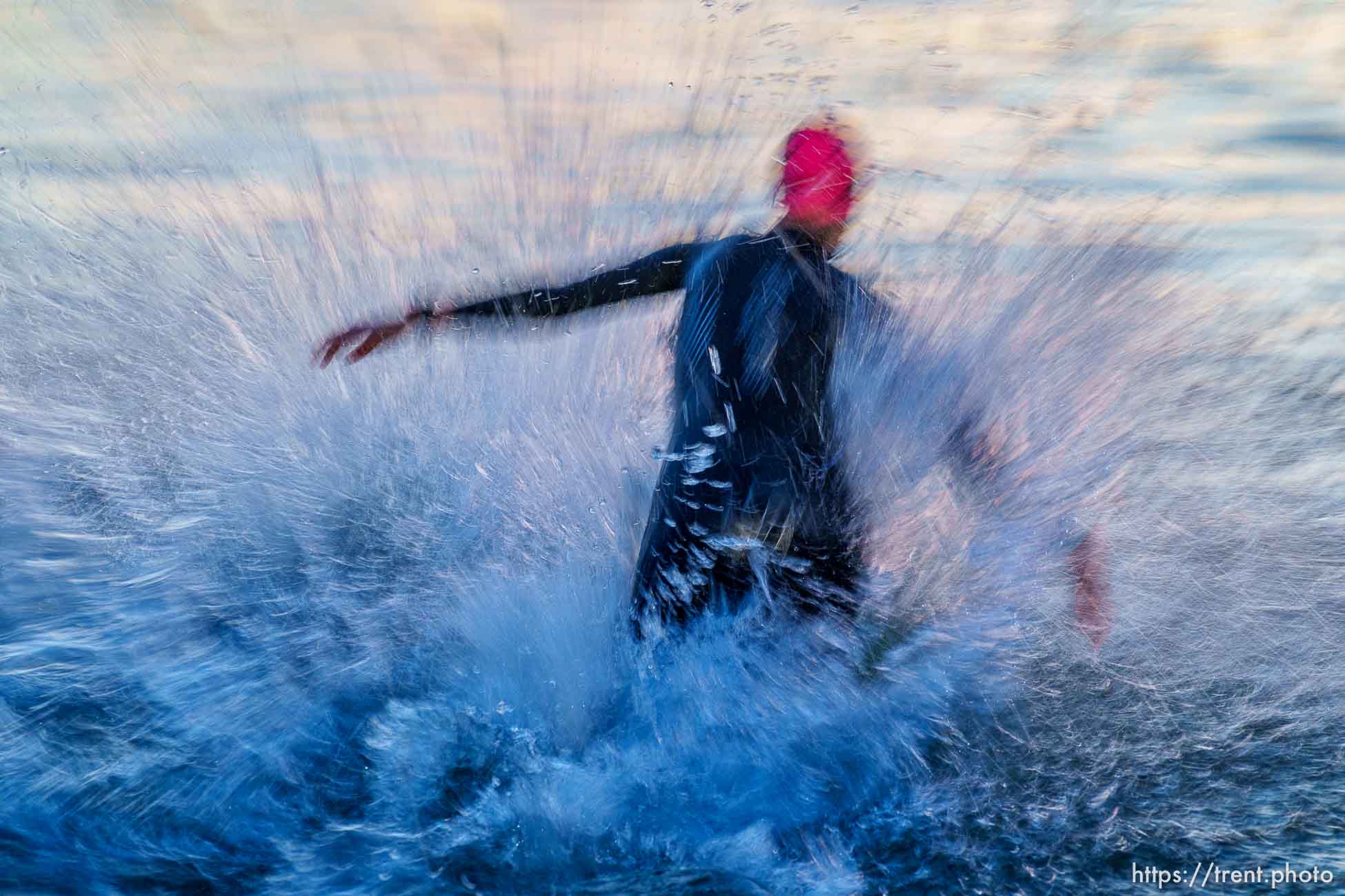 (Trent Nelson  |  The Salt Lake Tribune) Competitors swim at Sand Hollow Reservoir to start the Ironman World Championship triathlon in St. George on Saturday, May 7, 2022.