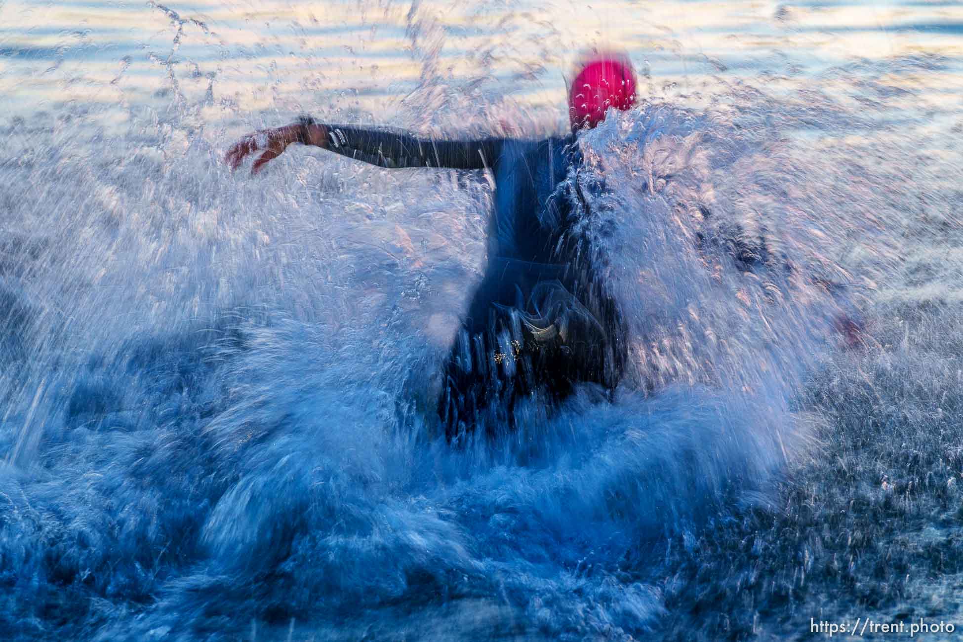 (Trent Nelson  |  The Salt Lake Tribune) Competitors swim at Sand Hollow Reservoir to start the Ironman World Championship triathlon in St. George on Saturday, May 7, 2022.