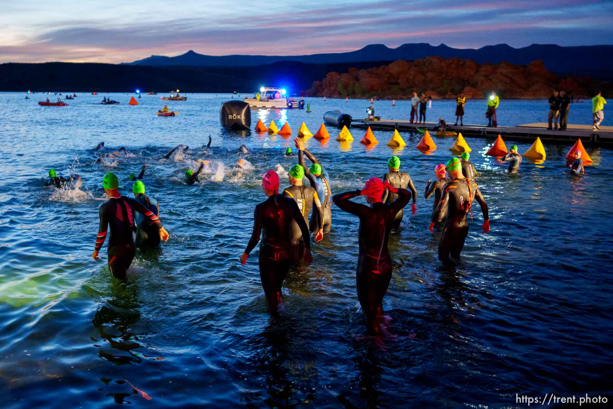 (Trent Nelson  |  The Salt Lake Tribune) Competitors swim at Sand Hollow Reservoir to start the Ironman World Championship triathlon in St. George on Saturday, May 7, 2022.