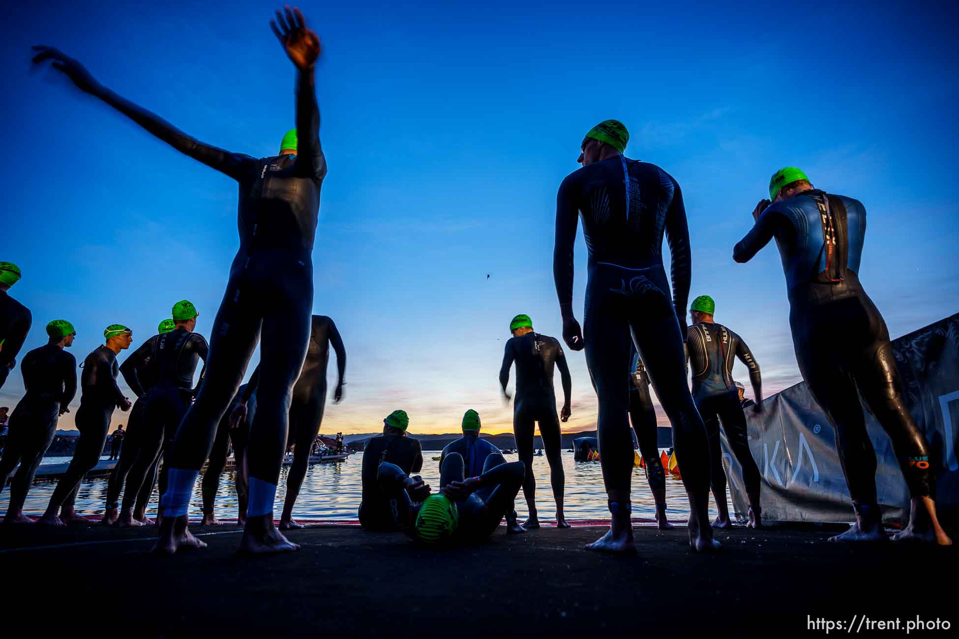 (Trent Nelson  |  The Salt Lake Tribune) Competitors in the pro men category prepare to start in the Ironman World Championship triathlon in St. George on Saturday, May 7, 2022.