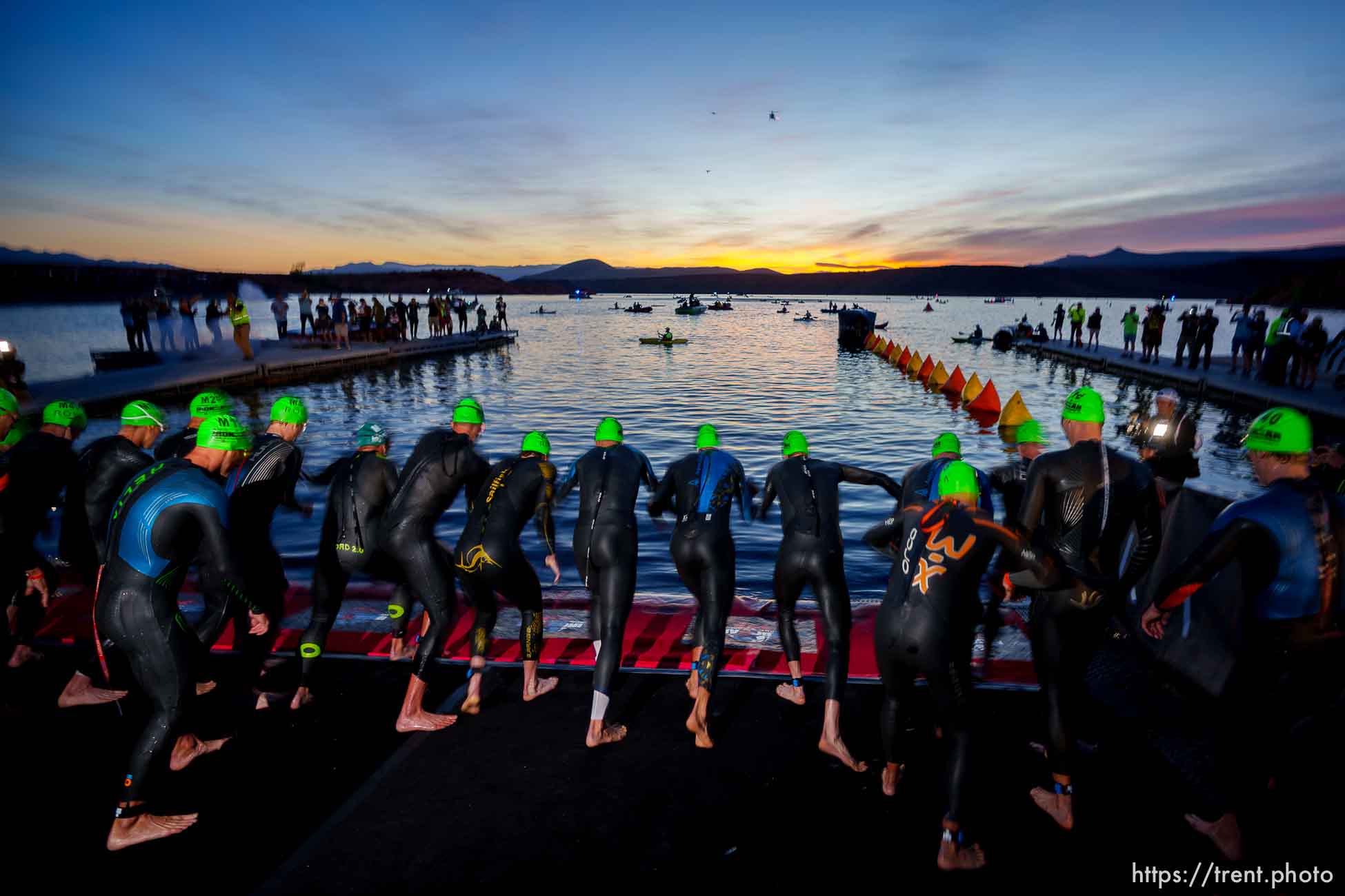 (Trent Nelson  |  The Salt Lake Tribune) Competitors in the pro men category prepare to start in the Ironman World Championship triathlon in St. George on Saturday, May 7, 2022.