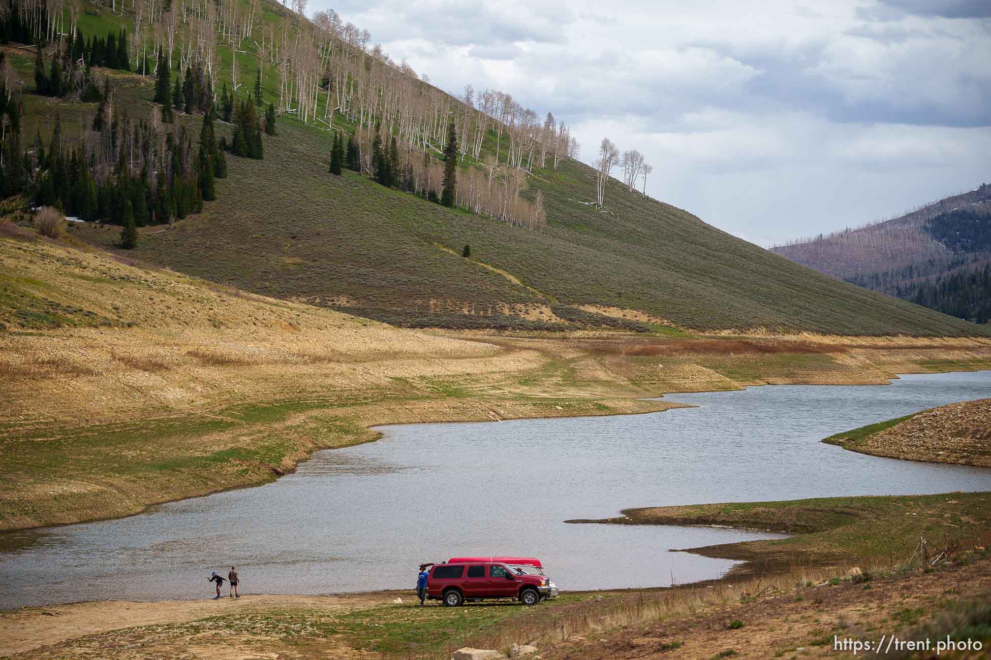 (Trent Nelson  |  The Salt Lake Tribune) Boys skip rocks at Electric Lake on Saturday, June 4, 2022.