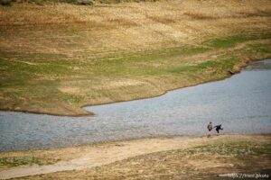 (Trent Nelson  |  The Salt Lake Tribune) Boys skip rocks at Electric Lake on Saturday, June 4, 2022.