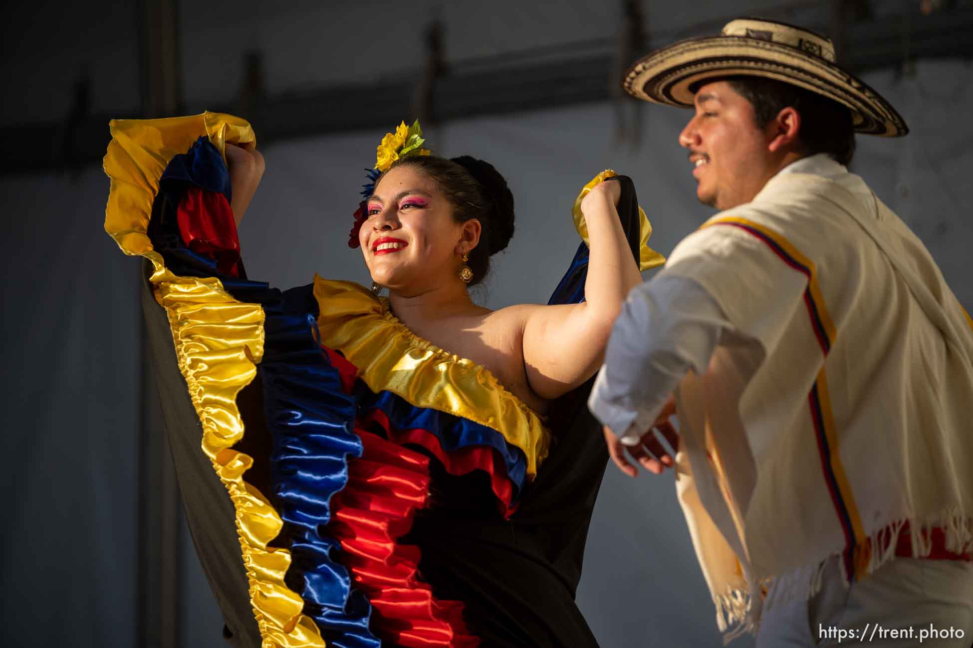 (Trent Nelson  |  The Salt Lake Tribune) Dancers performing a traditional Columbian dance at WestFest in West Valley City on Thursday, June 16, 2022.