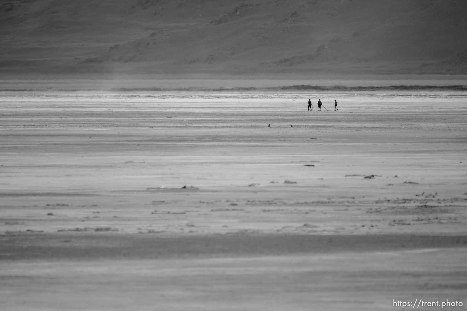 (Trent Nelson  |  The Salt Lake Tribune) Hikers at the Great Salt Lake on Saturday, June 18, 2022.