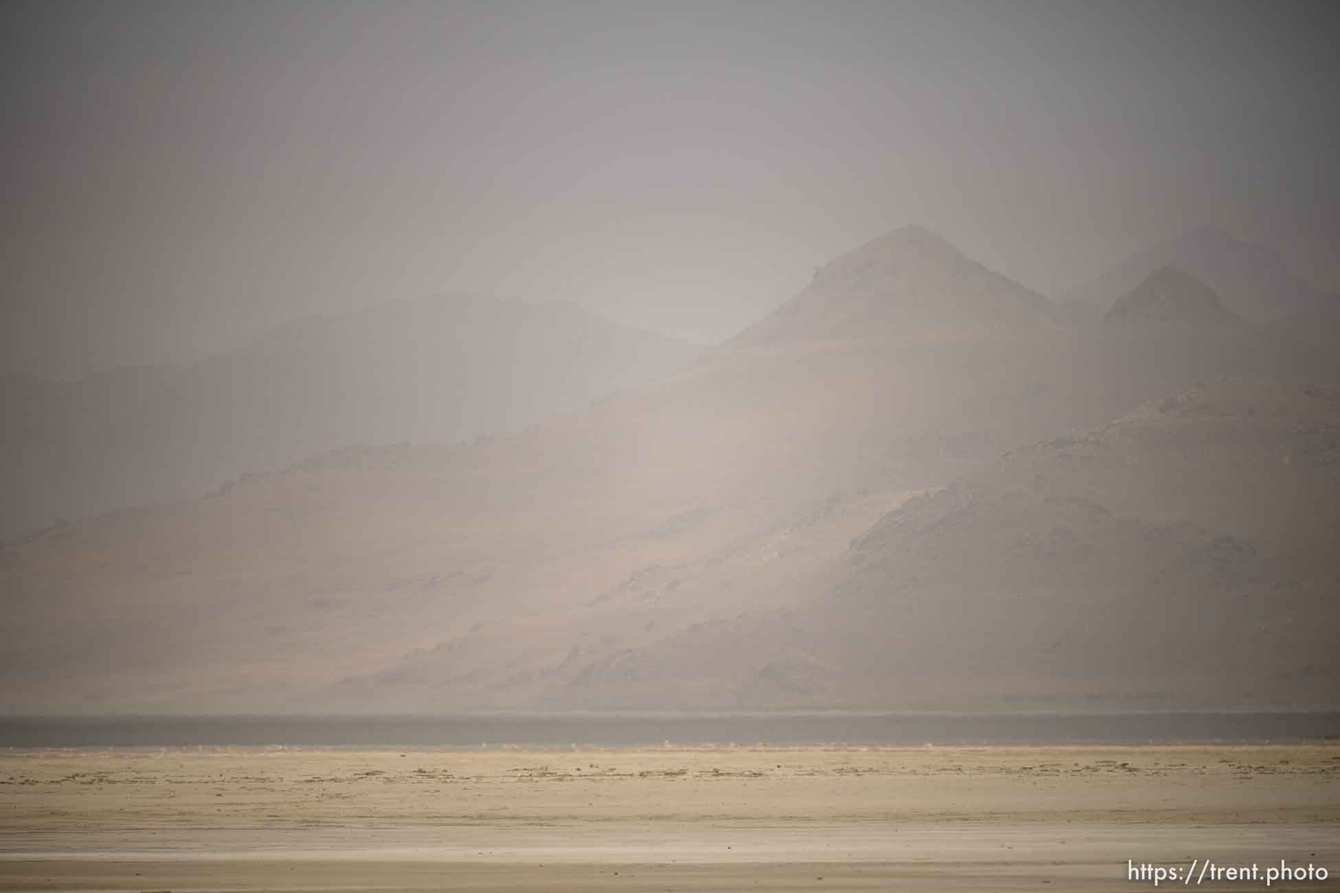 (Trent Nelson  |  The Salt Lake Tribune) Dust obscures Antelope Island and the Great Salt Lake on Saturday, June 18, 2022.