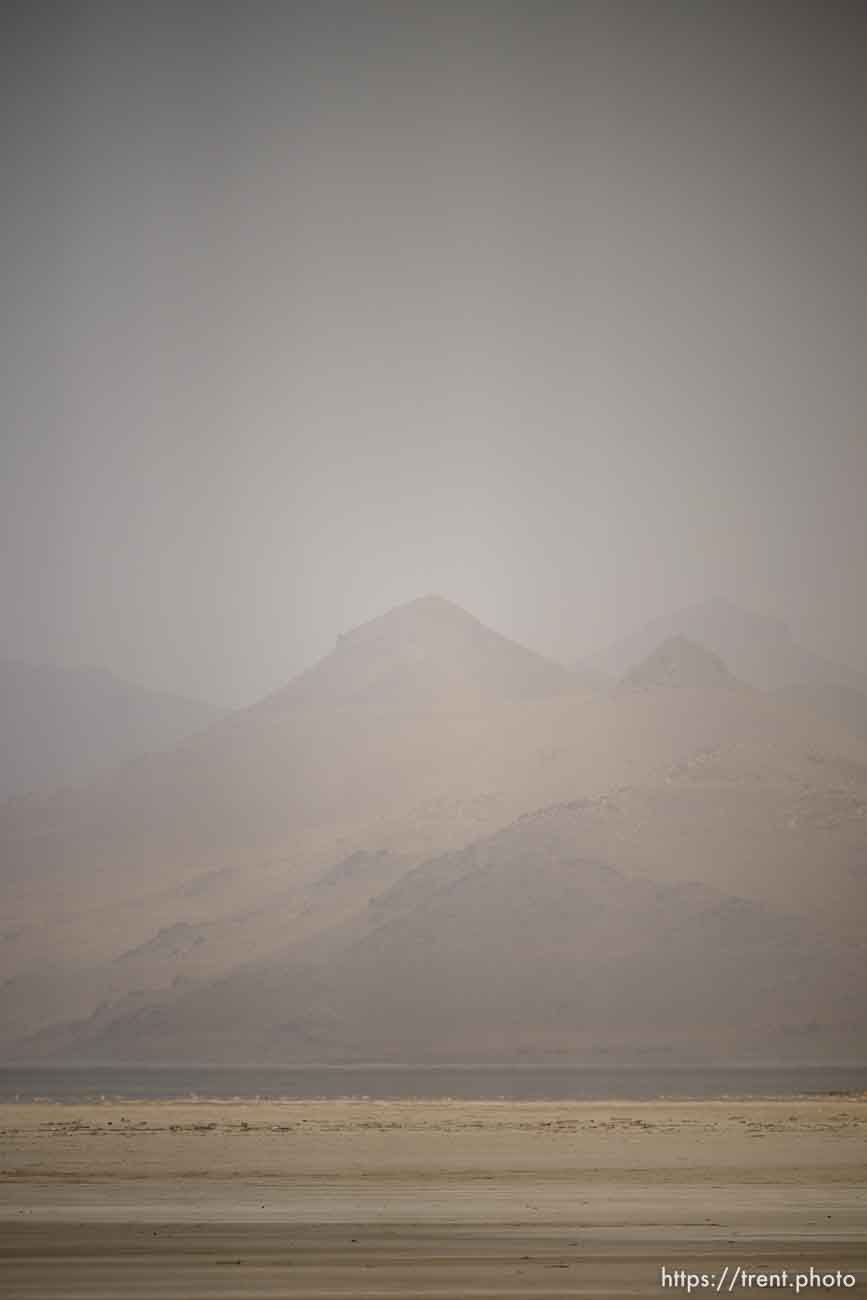 (Trent Nelson  |  The Salt Lake Tribune) Dust obscures Antelope Island and the Great Salt Lake on Saturday, June 18, 2022.