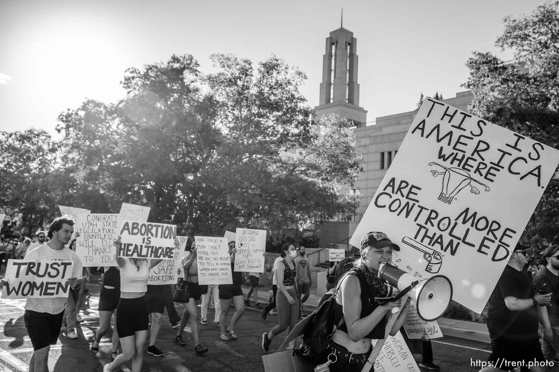 (Trent Nelson  |  The Salt Lake Tribune) People march through Salt Lake City to protest after the U.S. Supreme Court overruled Roe v. Wade, on Friday, June 24, 2022.