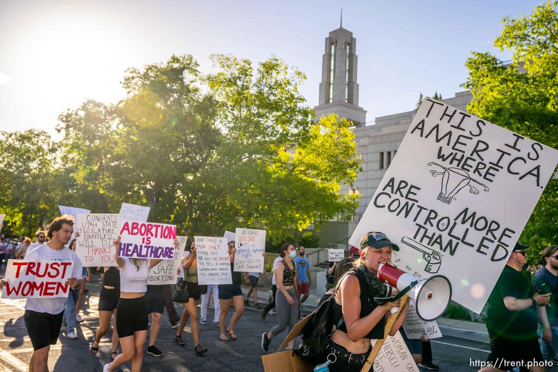 (Trent Nelson  |  The Salt Lake Tribune) People march through Salt Lake City to protest after the U.S. Supreme Court overruled Roe v. Wade, on Friday, June 24, 2022.