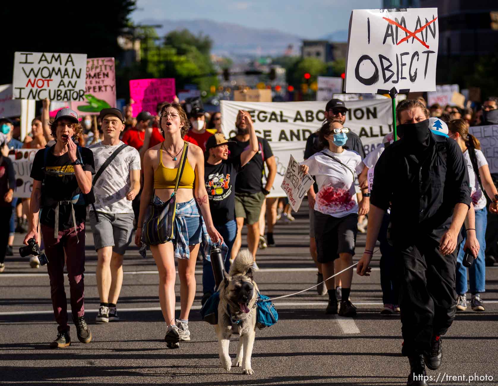 (Trent Nelson  |  The Salt Lake Tribune) People march up State Street at a protest in Salt Lake City after the U.S. Supreme Court overruled Roe v. Wade, on Friday, June 24, 2022.