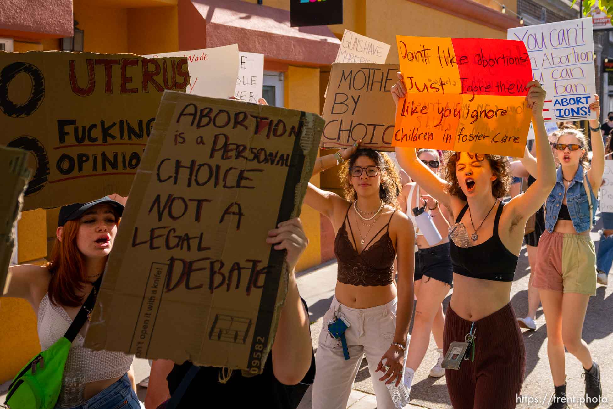 (Trent Nelson  |  The Salt Lake Tribune) People march through downtown Provo, protesting after the U.S. Supreme Court overruled Roe v. Wade, on Saturday, June 25, 2022.