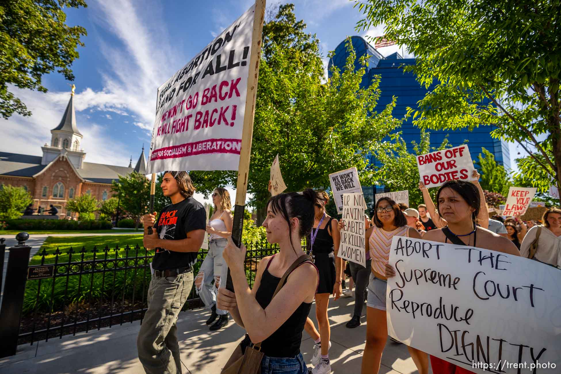 (Trent Nelson  |  The Salt Lake Tribune) People march through downtown Provo, protesting after the U.S. Supreme Court overruled Roe v. Wade, on Saturday, June 25, 2022.