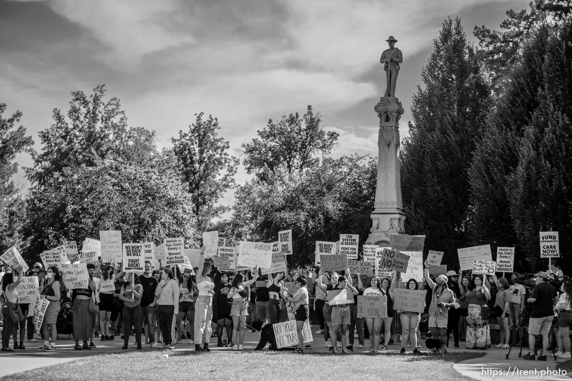 (Trent Nelson  |  The Salt Lake Tribune) People protest in Provo's Pioneer Park after the U.S. Supreme Court overruled Roe v. Wade, on Saturday, June 25, 2022.