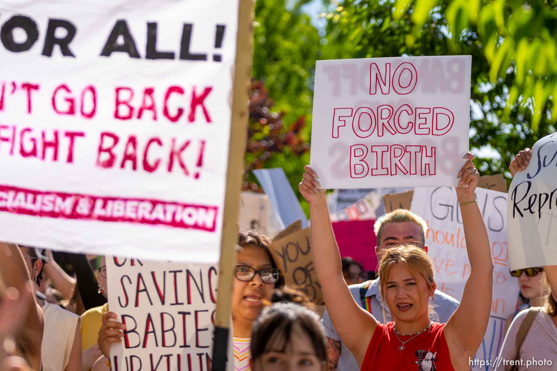 (Trent Nelson  |  The Salt Lake Tribune) People march through downtown Provo, protesting after the U.S. Supreme Court overruled Roe v. Wade, on Saturday, June 25, 2022.