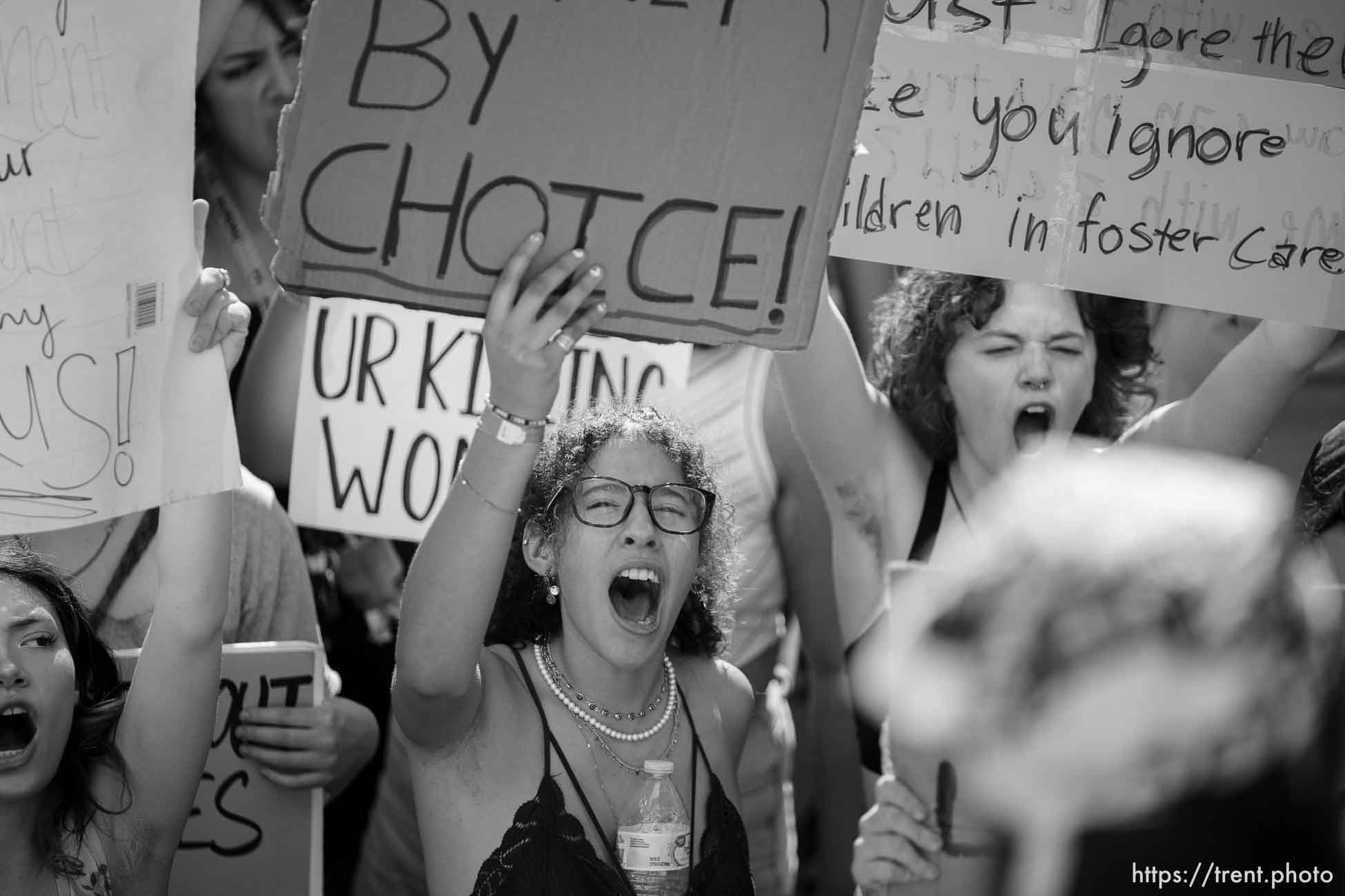 (Trent Nelson  |  The Salt Lake Tribune) People march through downtown Provo, protesting after the U.S. Supreme Court overruled Roe v. Wade, on Saturday, June 25, 2022.