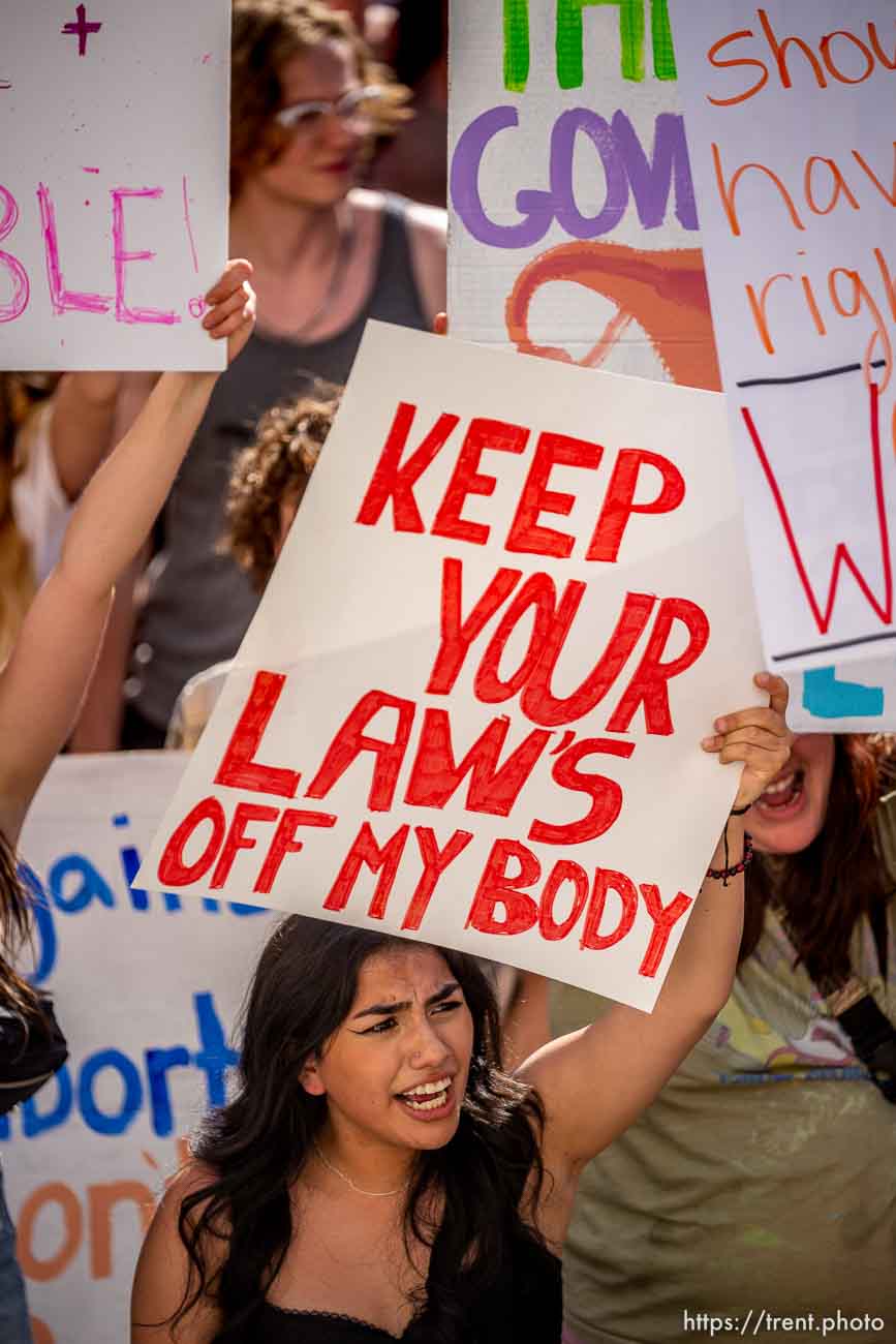 (Trent Nelson  |  The Salt Lake Tribune) People march through downtown Provo, protesting after the U.S. Supreme Court overruled Roe v. Wade, on Saturday, June 25, 2022.