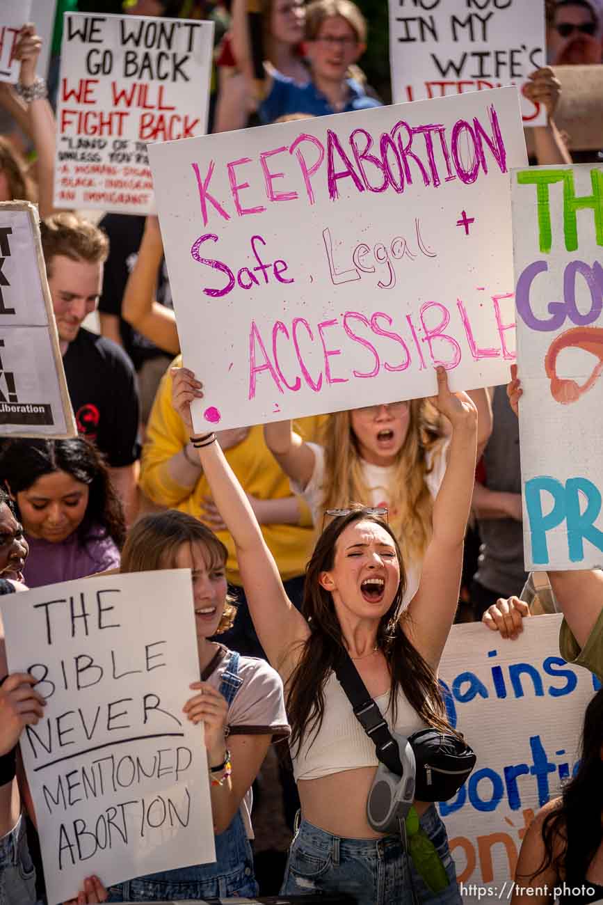 (Trent Nelson  |  The Salt Lake Tribune) People march through downtown Provo, protesting after the U.S. Supreme Court overruled Roe v. Wade, on Saturday, June 25, 2022.