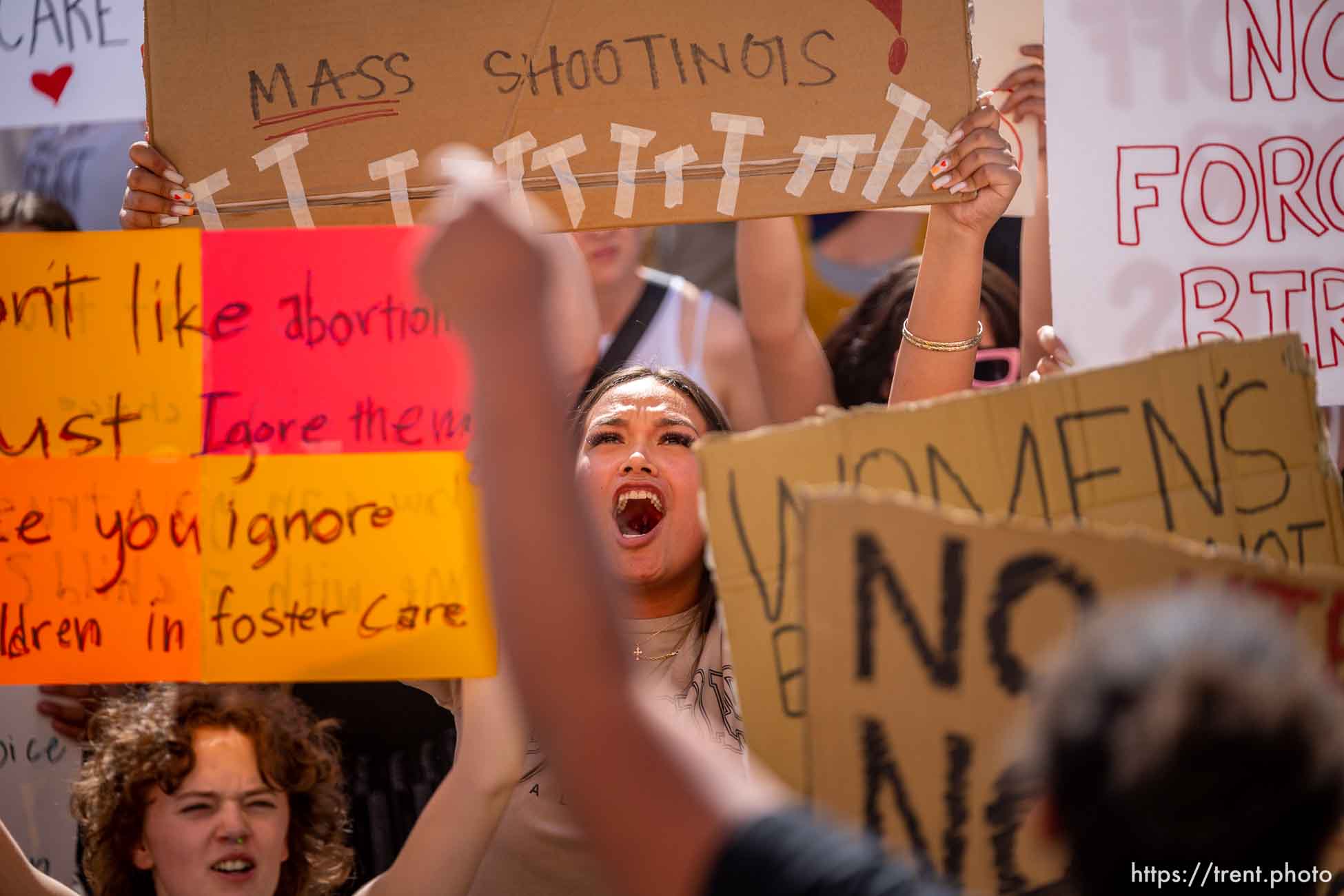 (Trent Nelson  |  The Salt Lake Tribune) People march through downtown Provo, protesting after the U.S. Supreme Court overruled Roe v. Wade, on Saturday, June 25, 2022.