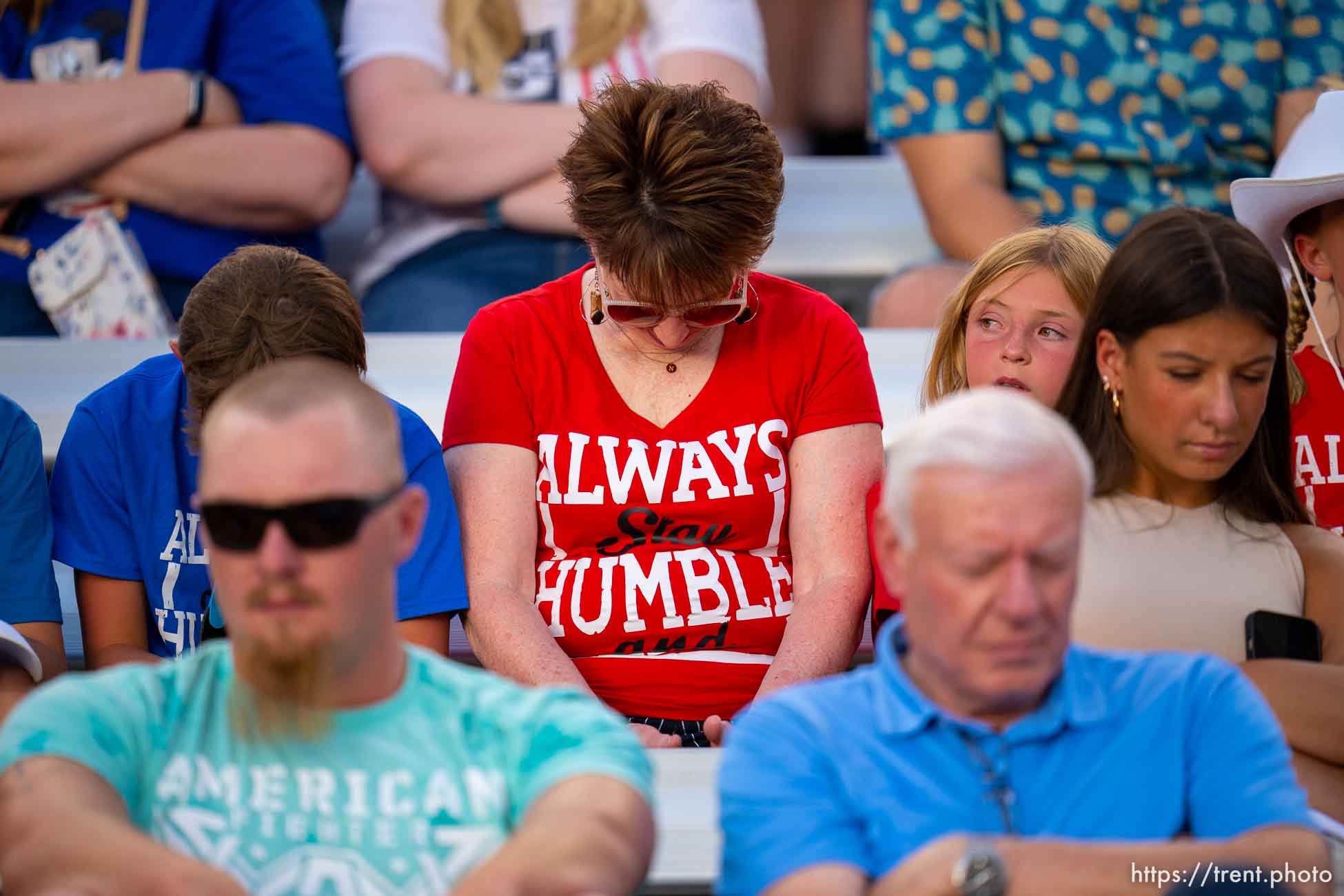 (Trent Nelson  |  The Salt Lake Tribune) during the prayer, at Stadium of Fire in Provo on Saturday, July 2, 2022.