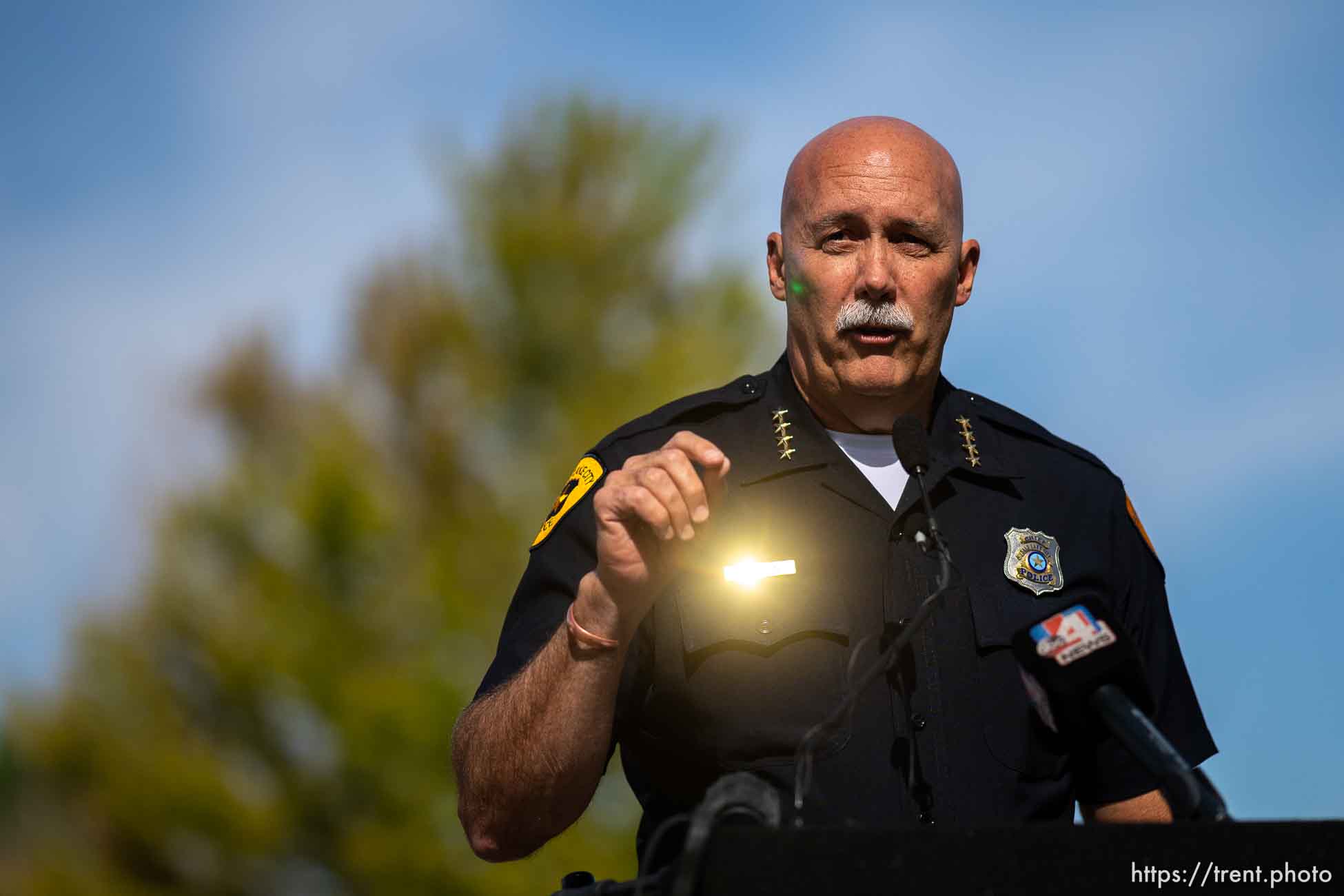 (Trent Nelson  |  The Salt Lake Tribune) Police Chief Mike Brown speaks before the swapping out a 25 mph speed limit sign for a new 20 mph sign, in Salt Lake City on Wednesday, July 27, 2022.