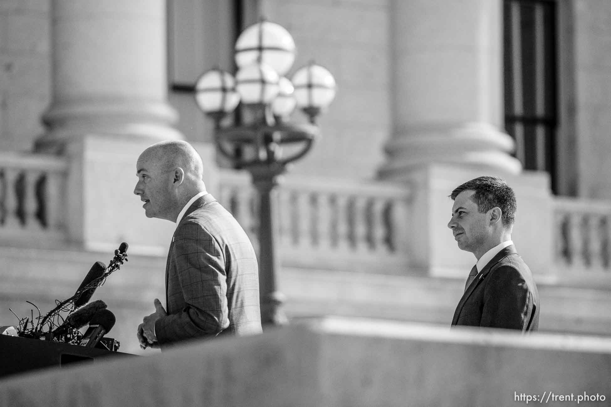 (Trent Nelson  |  The Salt Lake Tribune) Gov. Spencer Cox and Transportation Secretary Pete Buttigieg at a news conference at the State Capitol in Salt Lake City on Friday, July 29, 2022.