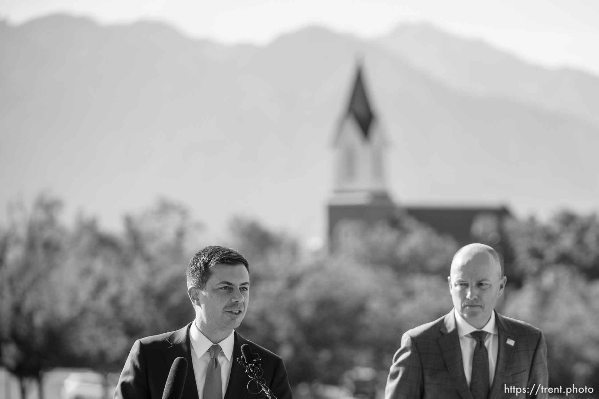 (Trent Nelson  |  The Salt Lake Tribune) Transportation Secretary Pete Buttigieg at a press conference at the State Capitol in Salt Lake City. At right is Gov. Spencer Cox.