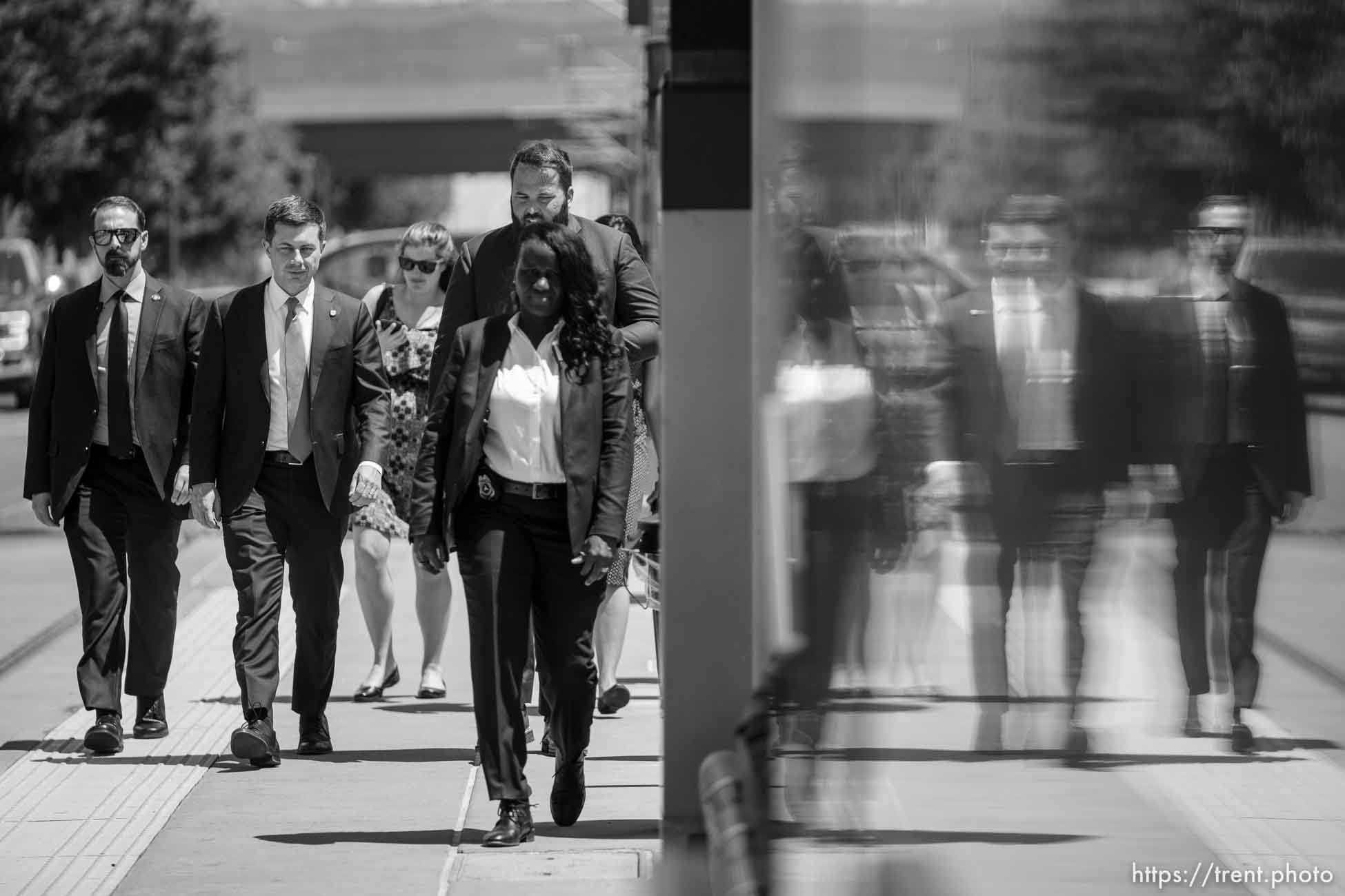 (Trent Nelson  |  The Salt Lake Tribune) Transportation Secretary Pete Buttigieg walks to the Jackson/Euclid station TRAX station in Salt Lake City on Friday, July 29, 2022.