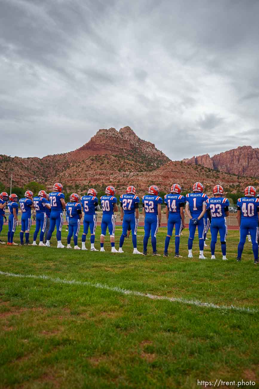 (Trent Nelson  |  The Salt Lake Tribune) Water Canyon High School football players prepare to face Grand County in their school's first football game, in Hildale on Friday, Aug. 12, 2022.