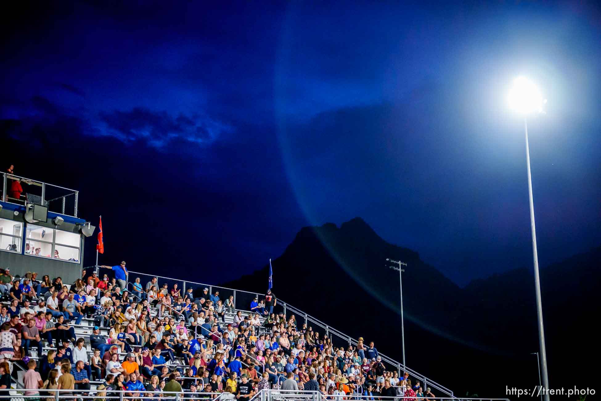 (Trent Nelson  |  The Salt Lake Tribune) Despite their home team trailing 0-50 in their first-ever football game, Water Canyon High School fans stick around until the final buzzer, in Hildale on Friday, Aug. 12, 2022.