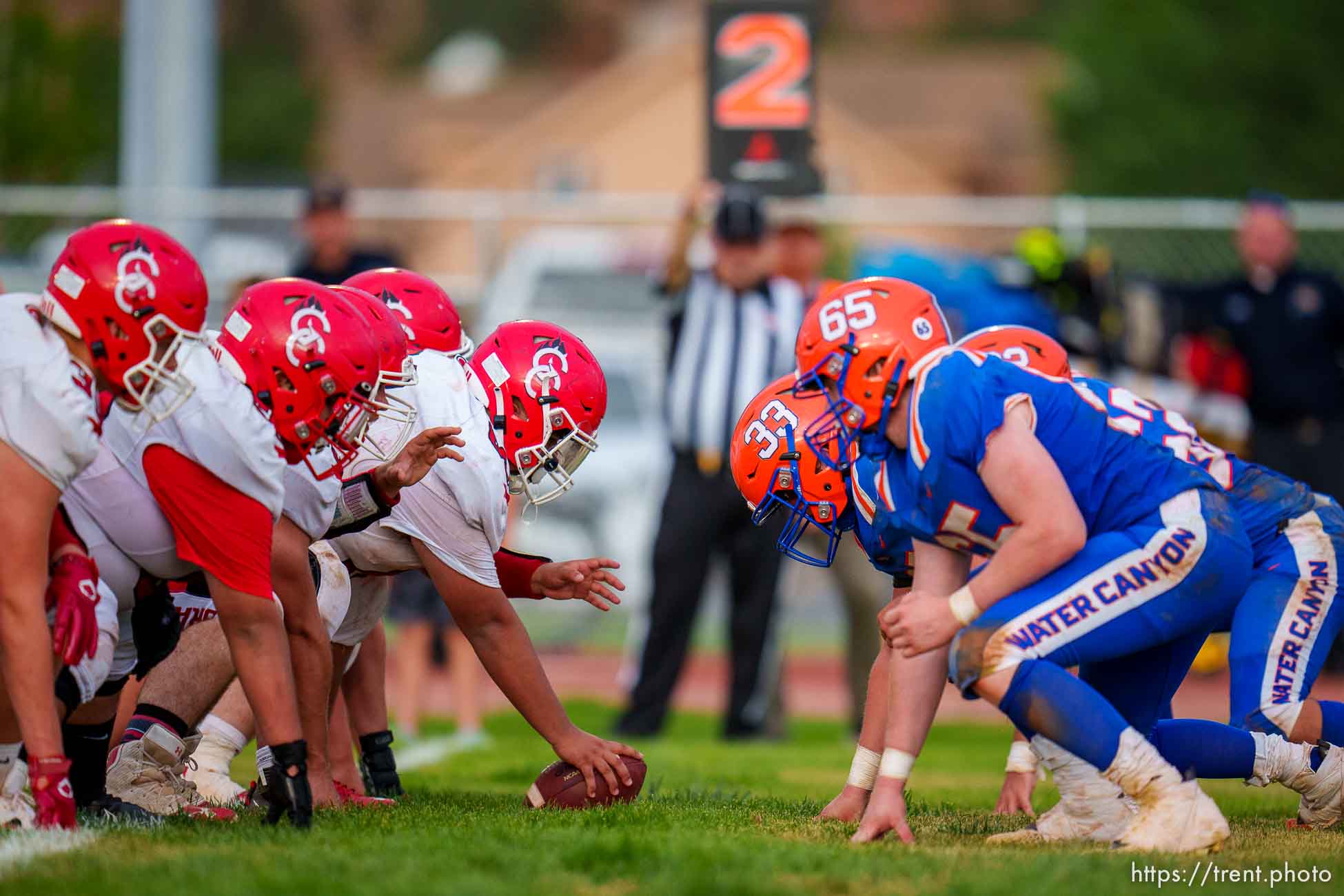 (Trent Nelson  |  The Salt Lake Tribune) Grand County and Water Canyon High School players line up in Water Canyon's first football game, in Hildale on Friday, Aug. 12, 2022.