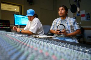 (Trent Nelson  |  The Salt Lake Tribune) Daniel Morante, right, prepares to record a vocal track in the recording studio at Salt Lake Community College on Friday, Aug. 26, 2022. At left is Jesus Zavala.