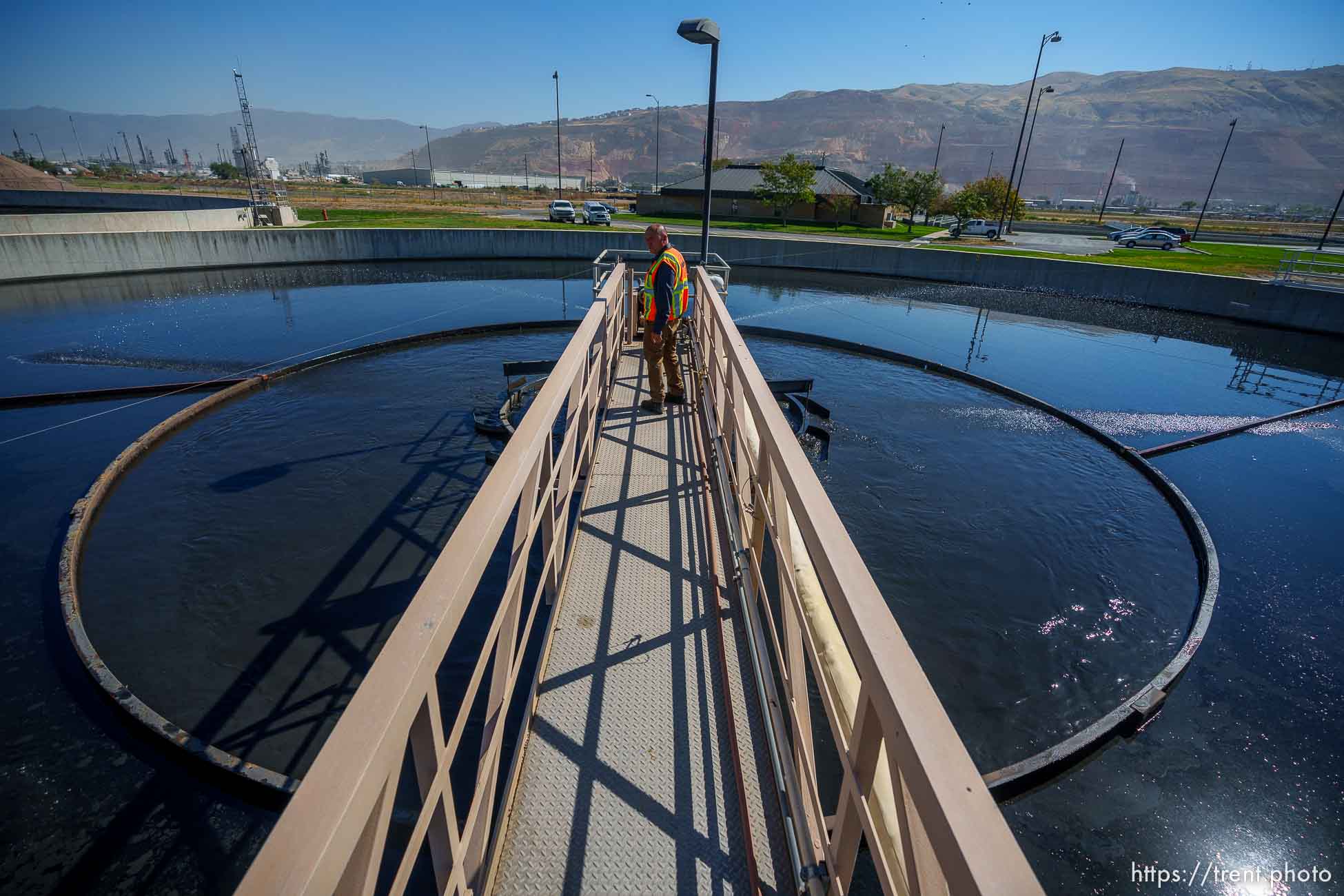 (Trent Nelson  |  The Salt Lake Tribune) Jose Rubalcaba, operations manager overlooks a clarifier at Salt Lake City Public Utilities' Water Reclamation Facility on Tuesday, Aug. 30, 2022.