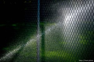 sprinklers at an LDS chapel in Salt Lake City on Thursday, Sept. 8, 2022.