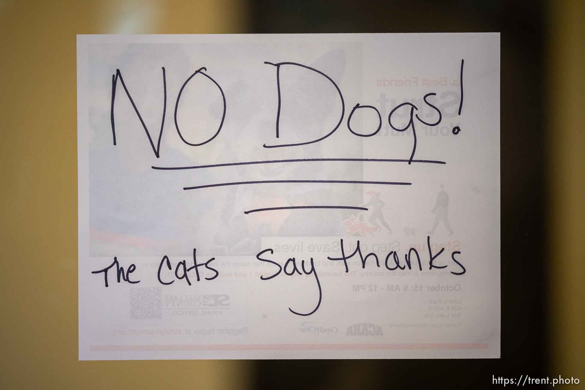 (Trent Nelson  |  The Salt Lake Tribune) A sign on the door to the cat area at the 7th Annual Petapalooza: Pet Adoption at Wheeler Historic Farm in Sandy on Saturday, Sept. 24, 2022.