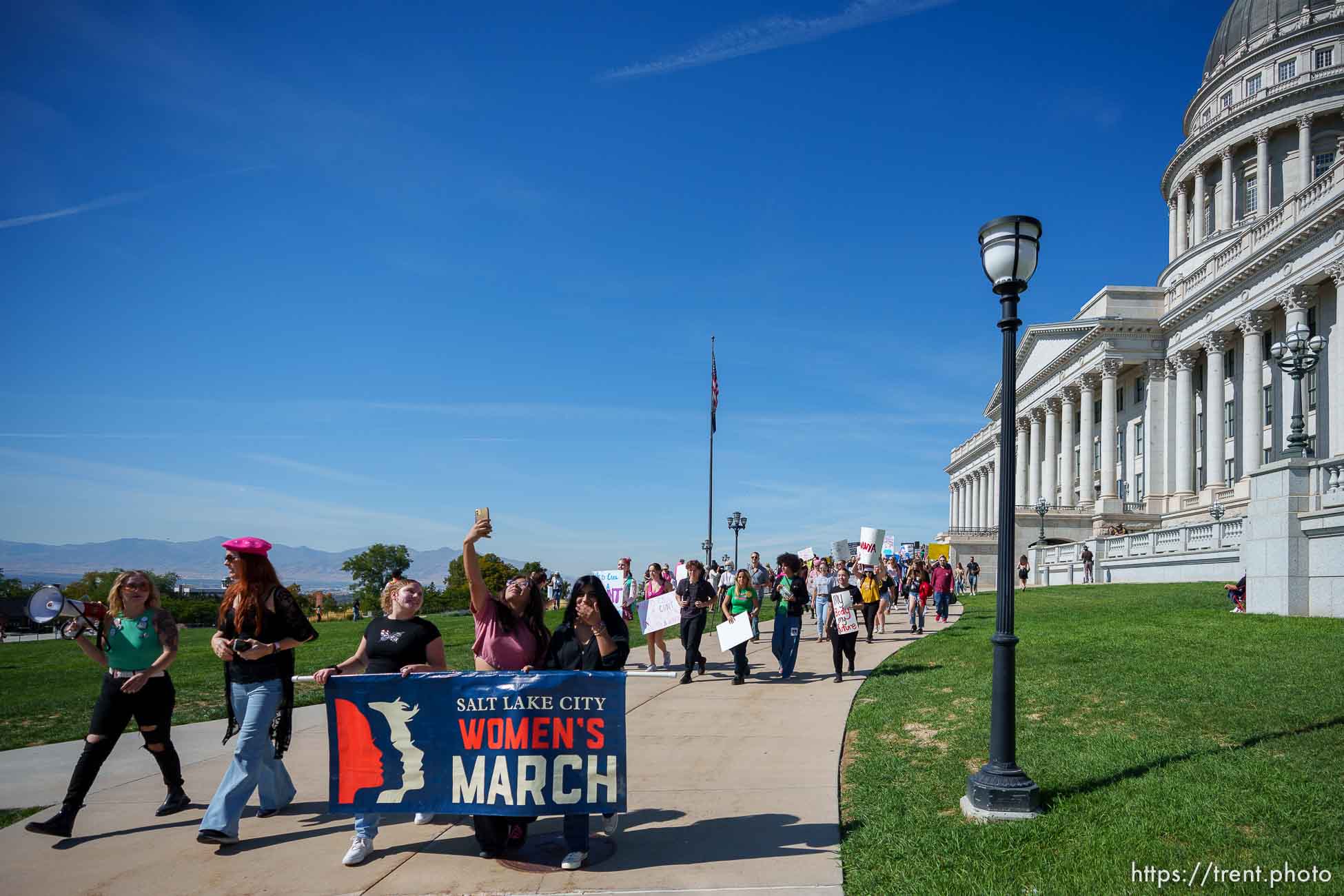 (Trent Nelson  |  The Salt Lake Tribune) People march around the State Capitol in Salt Lake City in support of abortion rights on Saturday, Oct. 8, 2022.