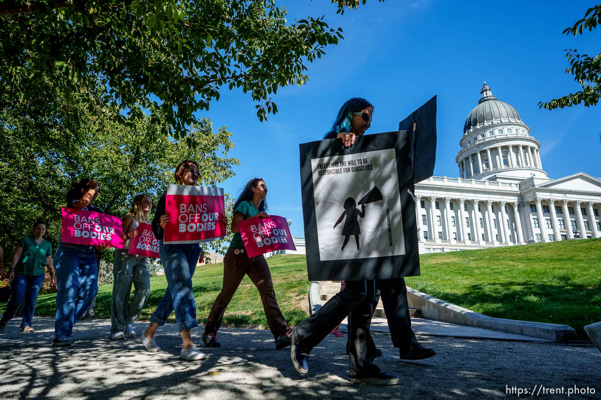 (Trent Nelson  |  The Salt Lake Tribune) People march around the State Capitol in Salt Lake City in support of abortion rights on Saturday, Oct. 8, 2022.