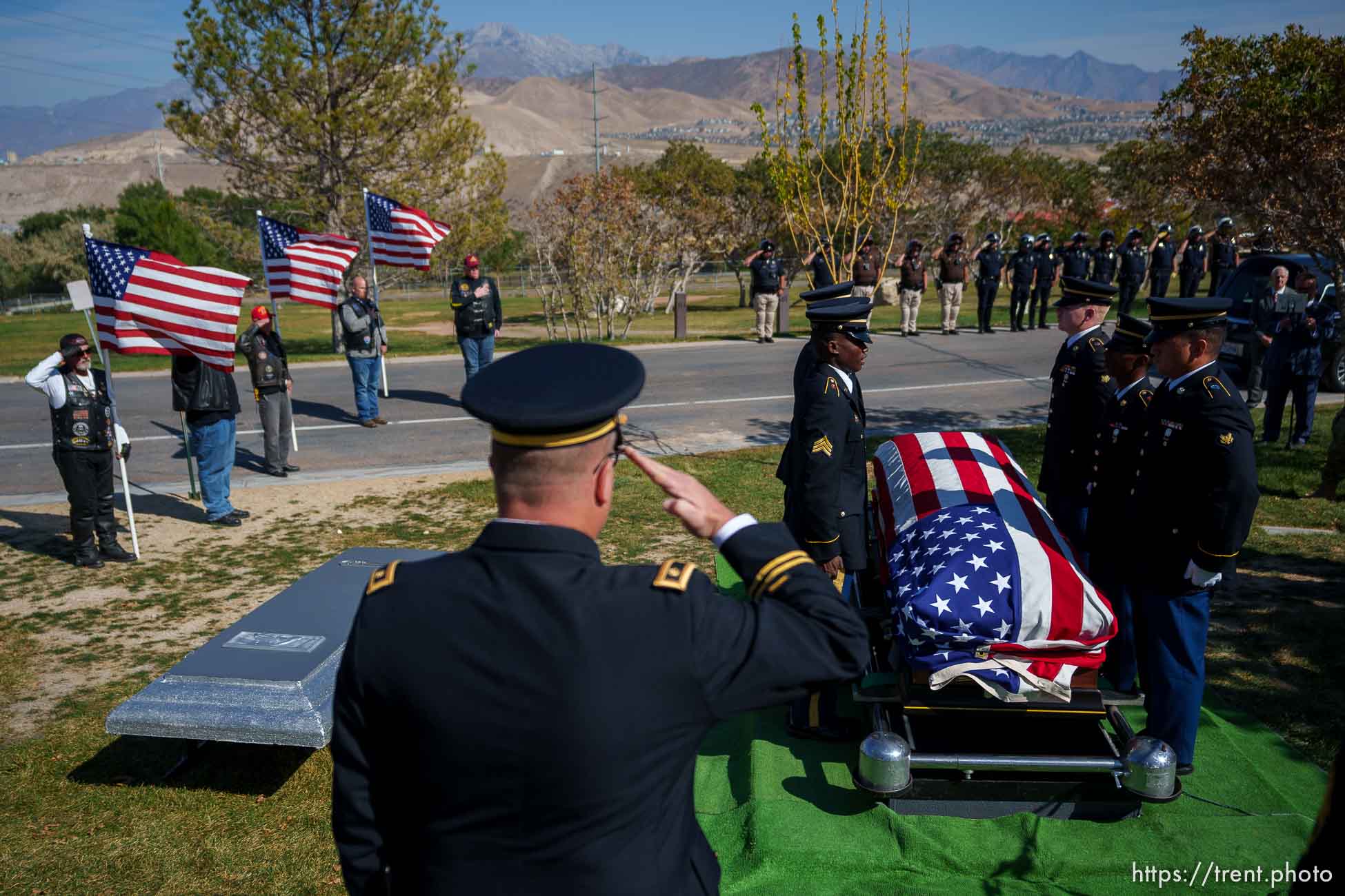 (Trent Nelson  |  The Salt Lake Tribune)  Sgt. Elvin Lee Phillips is laid to rest at Utah Veteran’s Cemetery and Memorial Park in Bluffdale on Tuesday, Oct. 11, 2022, almost 80 years after he was killed in action during World War II.