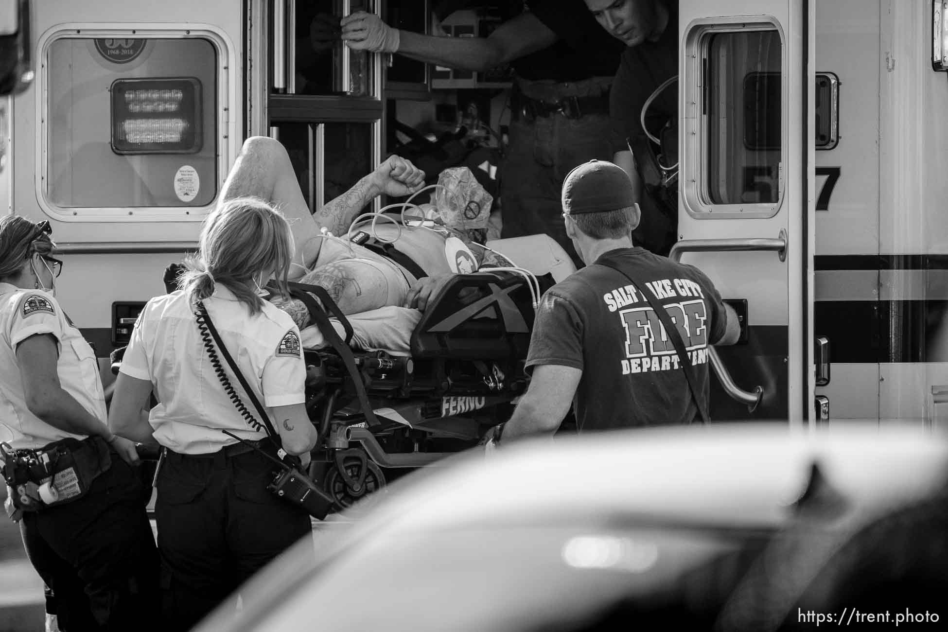 (Trent Nelson  |  The Salt Lake Tribune) Police at the scene of a shooting at Wasatch Inn, on State Street in the Ballpark neighborhood of Salt Lake City on Tuesday, Oct. 11, 2022.