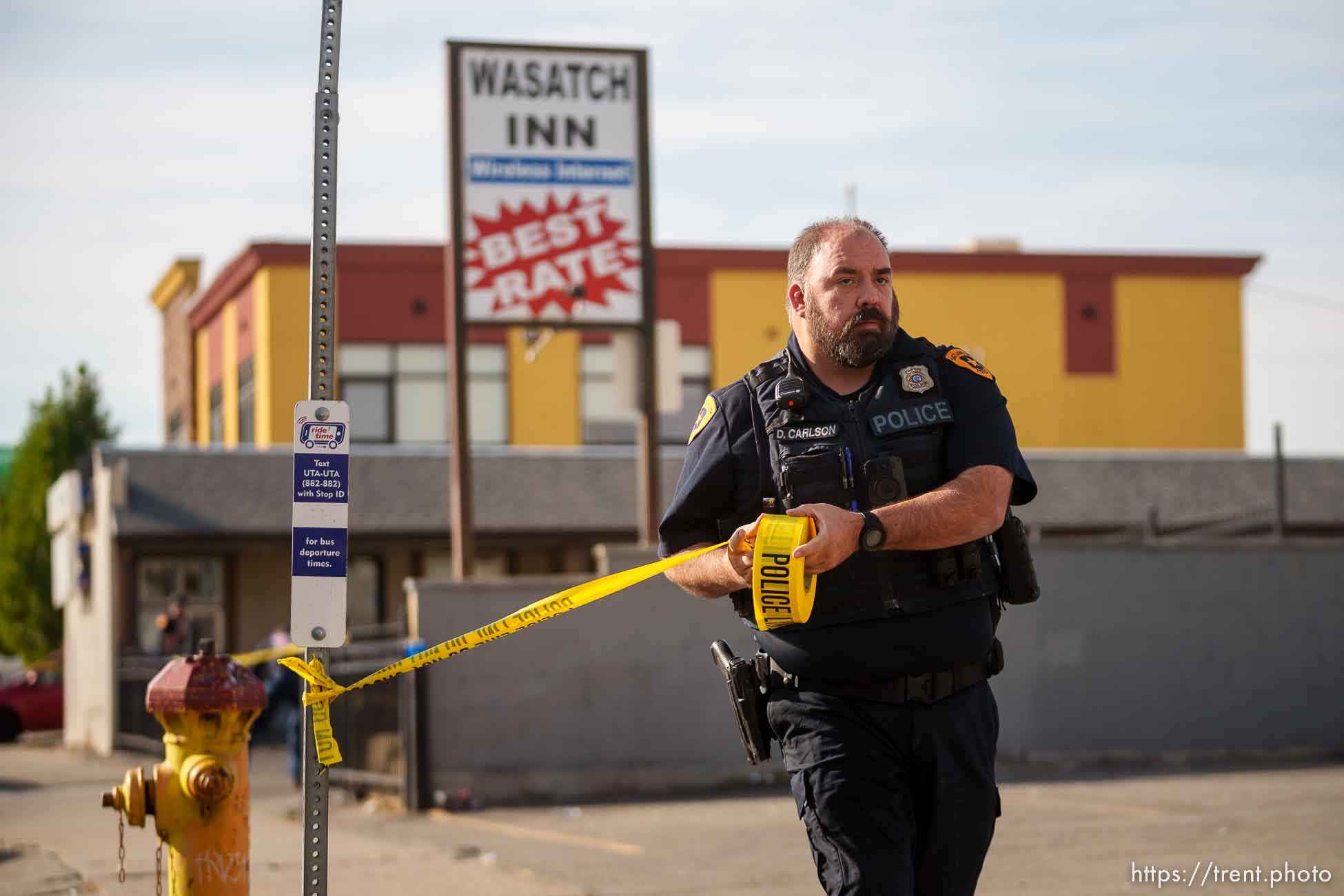 (Trent Nelson  |  The Salt Lake Tribune) Police at the scene of a shooting at Wasatch Inn, on State Street in the Ballpark neighborhood of Salt Lake City on Tuesday, Oct. 11, 2022.