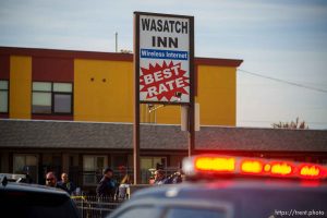 (Trent Nelson  |  The Salt Lake Tribune) Police at the scene of a shooting at Wasatch Inn, on State Street in the Ballpark neighborhood of Salt Lake City on Tuesday, Oct. 11, 2022.