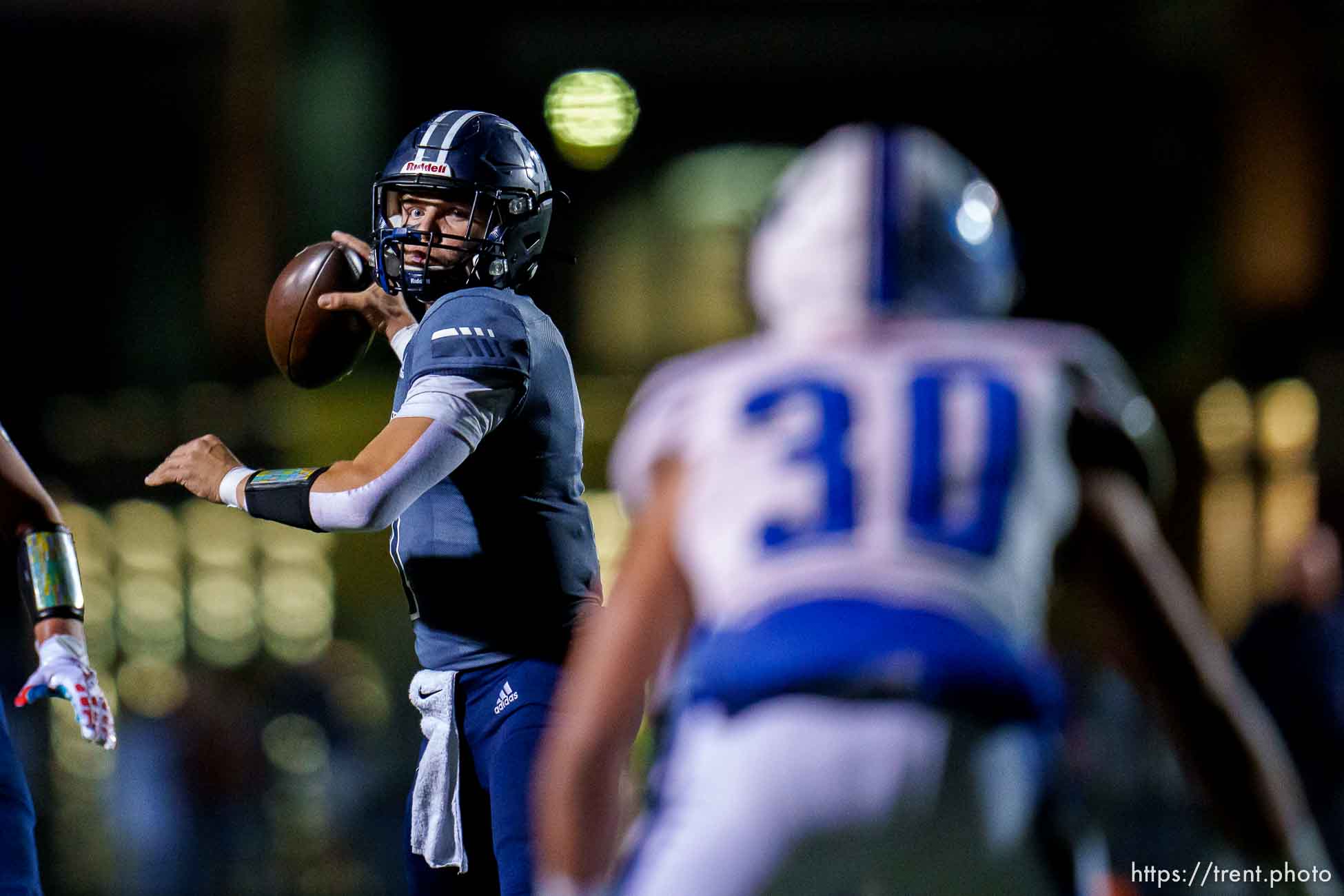 (Trent Nelson  |  The Salt Lake Tribune) Corner Canyon quarterback Isaac Wilson in action vs Pleasant Grove, in Draper on Wednesday, Oct. 12, 2022.