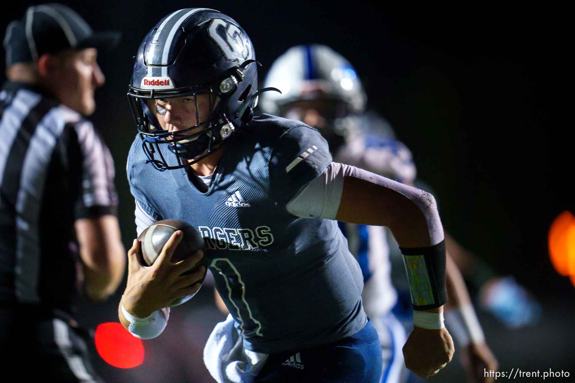 (Trent Nelson  |  The Salt Lake Tribune) Corner Canyon quarterback Isaac Wilson runs for a touchdown vs Pleasant Grove, in Draper on Wednesday, Oct. 12, 2022.