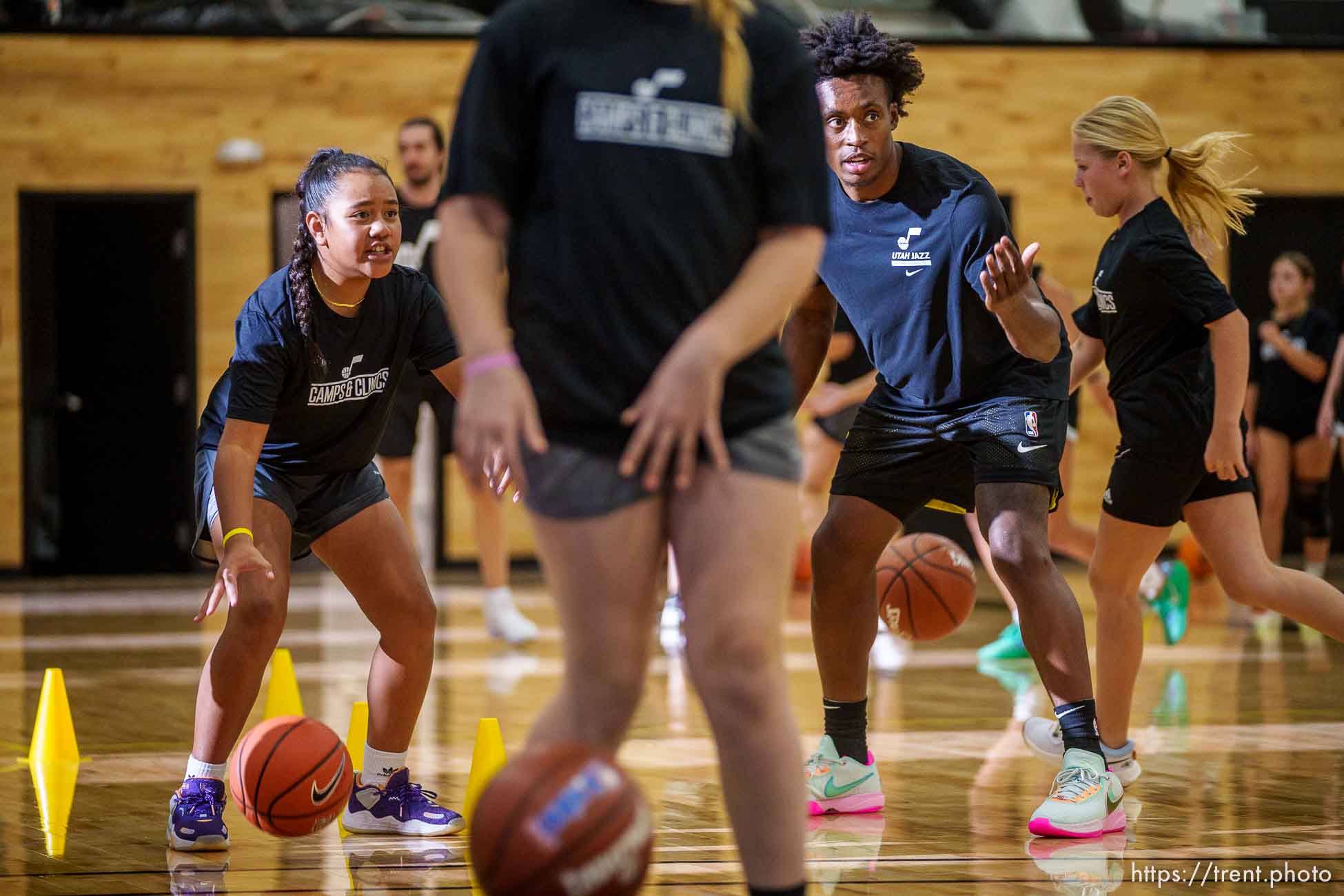 (Trent Nelson  |  The Salt Lake Tribune) Utah Jazz guard Collin Sexton runs a basketball workshop for girls in Lehi on Thursday, Oct. 13, 2022.