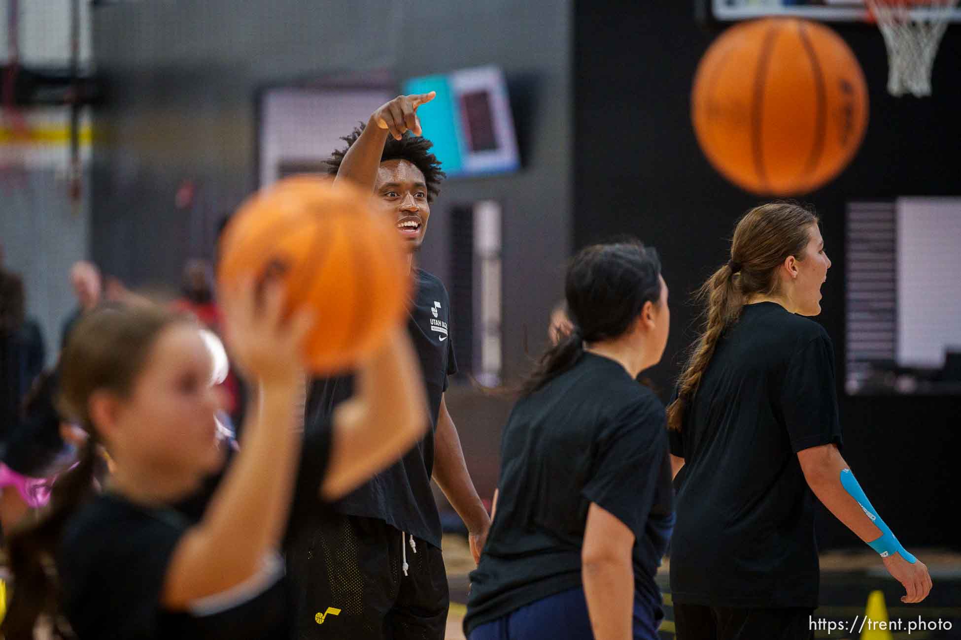 (Trent Nelson  |  The Salt Lake Tribune) Utah Jazz guard Collin Sexton runs a basketball workshop for girls in Lehi on Thursday, Oct. 13, 2022.