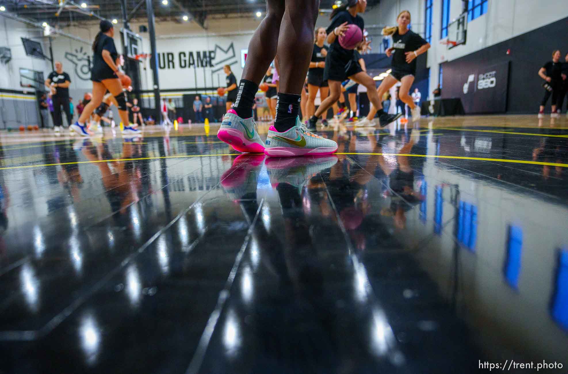 (Trent Nelson  |  The Salt Lake Tribune) Utah Jazz guard Collin Sexton runs a basketball workshop for girls in Lehi on Thursday, Oct. 13, 2022.