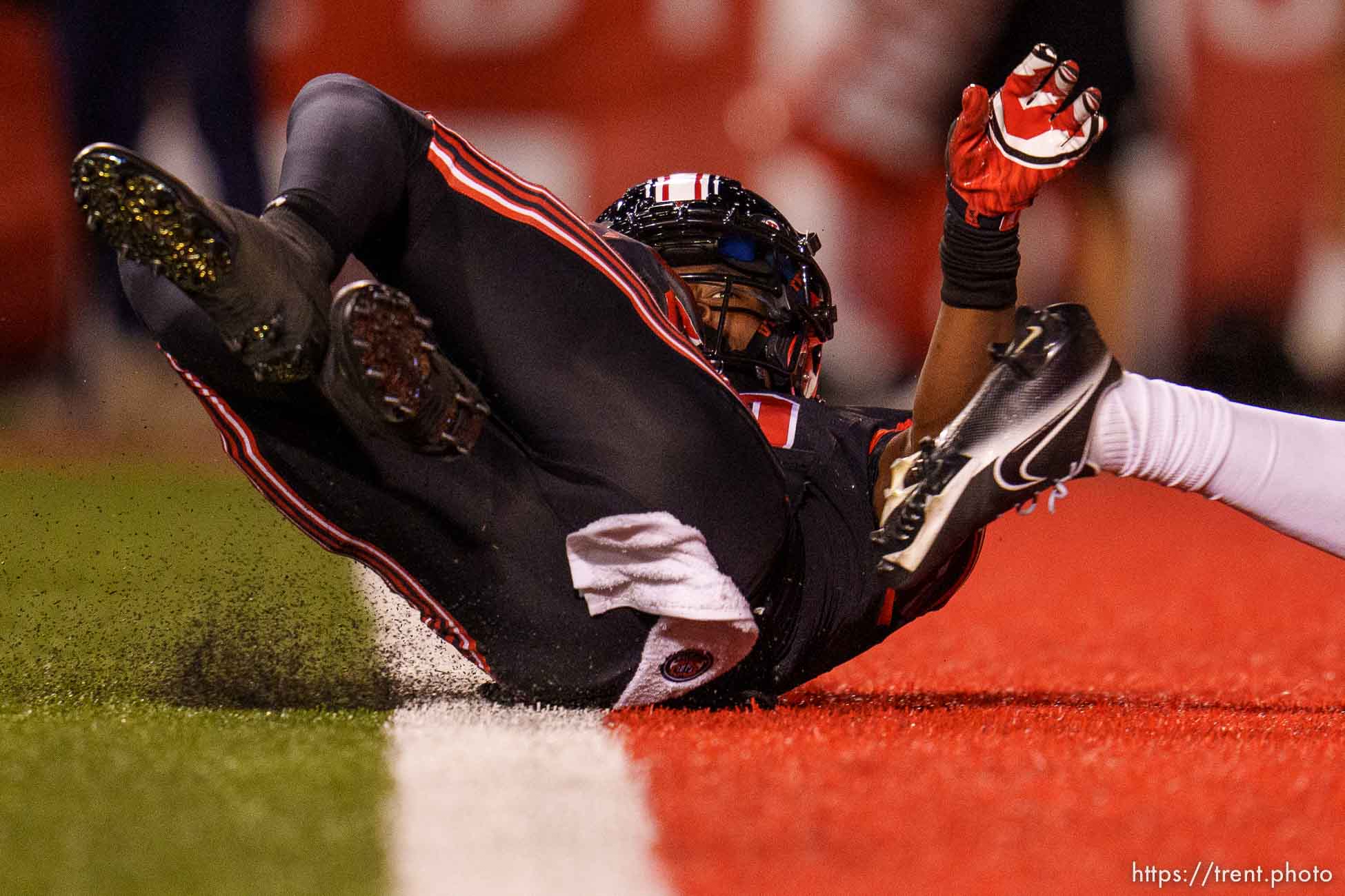 (Trent Nelson  |  The Salt Lake Tribune) Utah Utes wide receiver Money Parks (10) slides into the end zone after catching a pass as the University of Utah hosts USC, NCAA football in Salt Lake City on Saturday, Oct. 15, 2022.