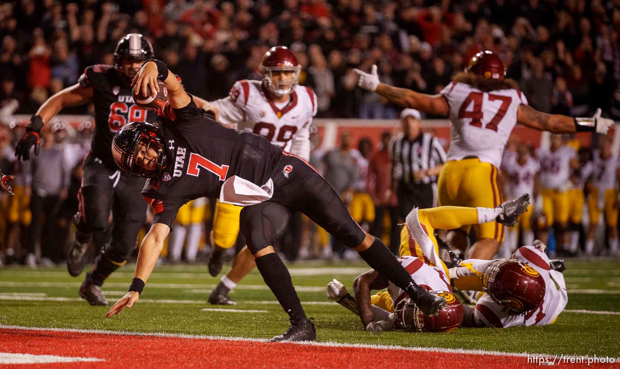 (Trent Nelson  |  The Salt Lake Tribune) Utah Utes quarterback Cameron Rising (7) scores a game-winning two-point conversion as the University of Utah hosts USC, NCAA football in Salt Lake City on Saturday, Oct. 15, 2022.