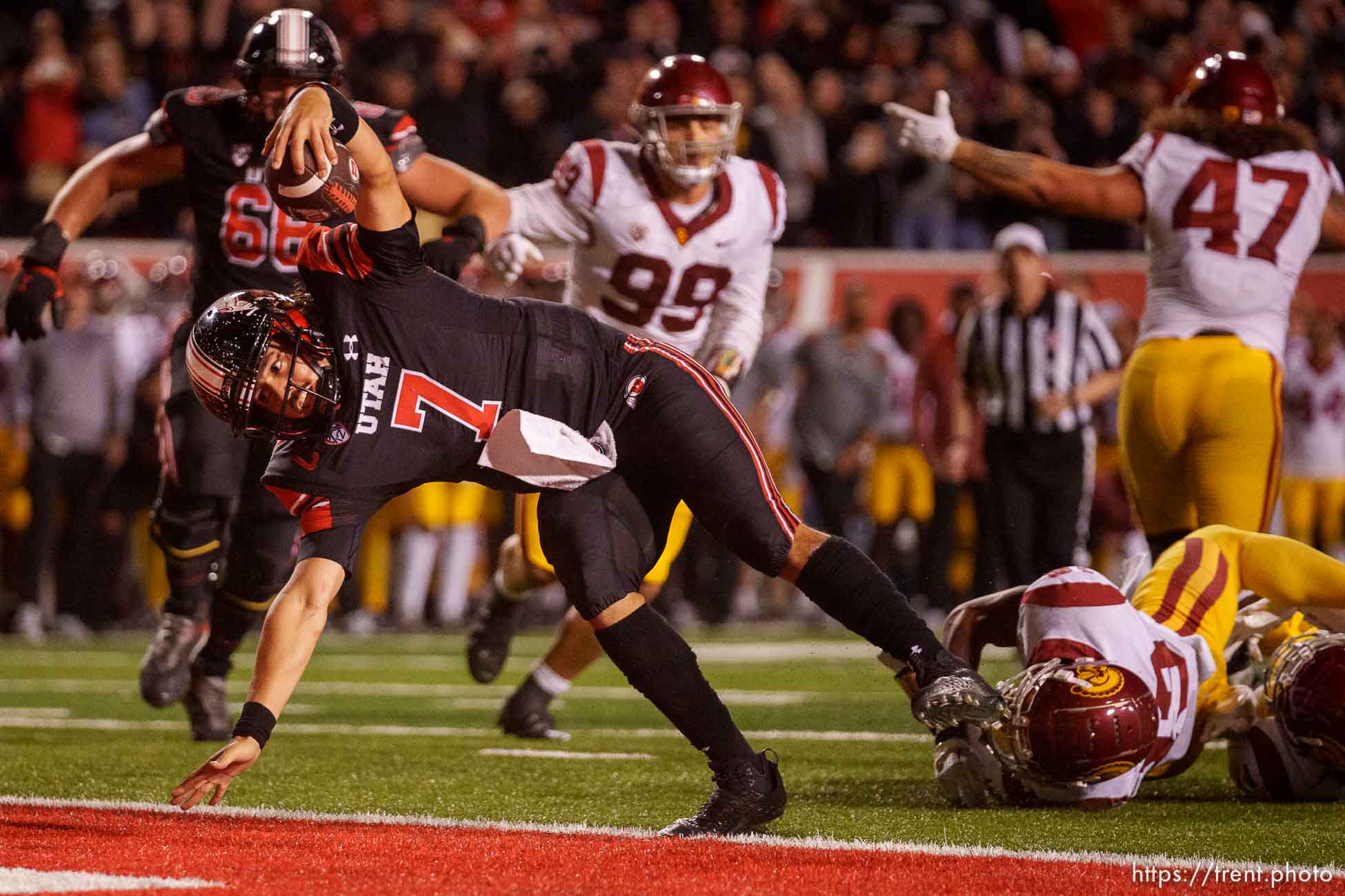 (Trent Nelson  |  The Salt Lake Tribune) Utah Utes quarterback Cameron Rising (7) scores a game-winning two-point conversion as the University of Utah hosts USC, NCAA football in Salt Lake City on Saturday, Oct. 15, 2022.